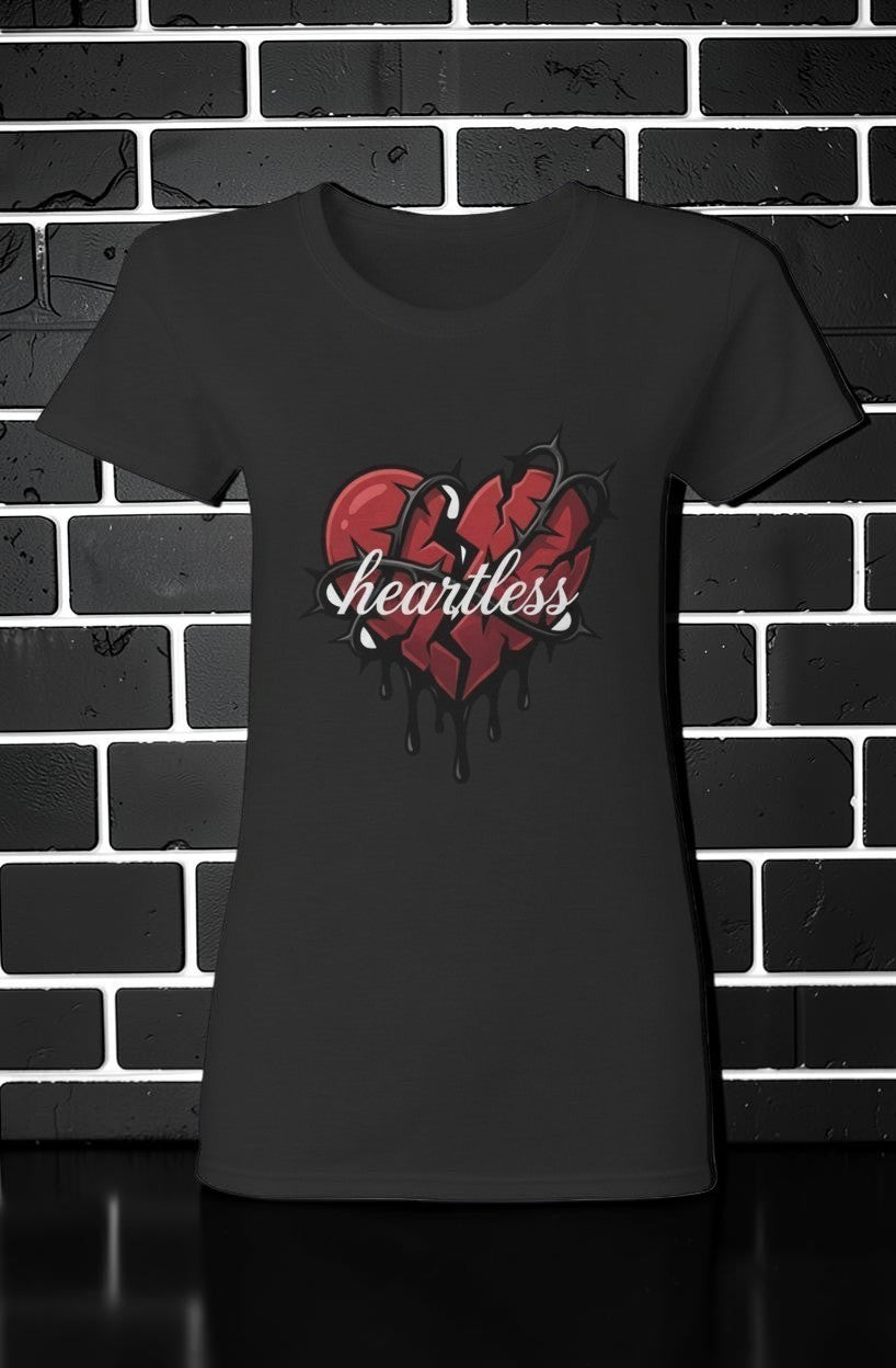 CocoMe Couture black heavy cotton women's tee featuring a red broken heart graphic with thorns and heartless text