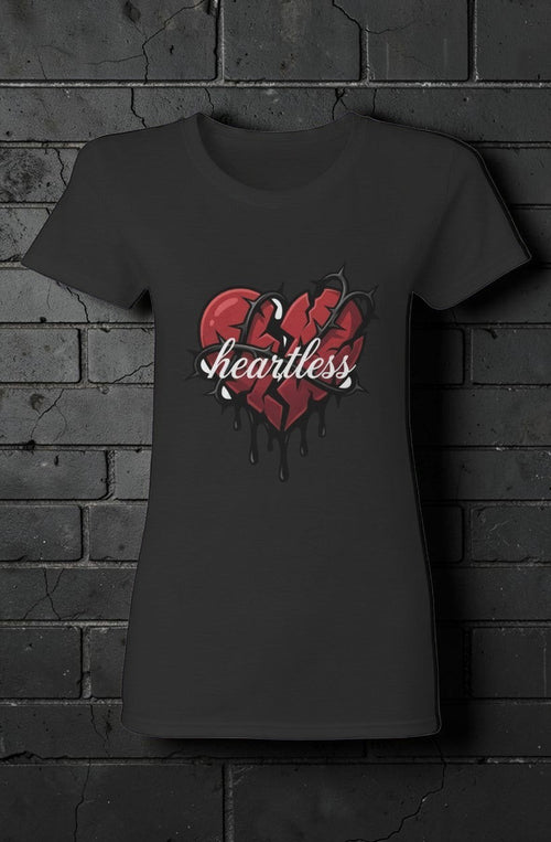 CocoMe Couture black heavy cotton tee featuring a red broken heart graphic with thorns and the word heartless