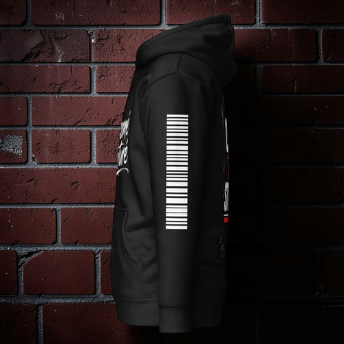 CocoMe Couture black premium hoodie with white sleeve graphic against a red brick wall background