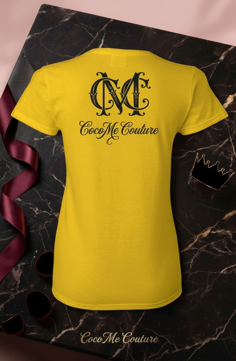 CocoMe Couture gold heavy cotton tee with black logo print on back, featuring a semi-fitted cut and cap sleeves.