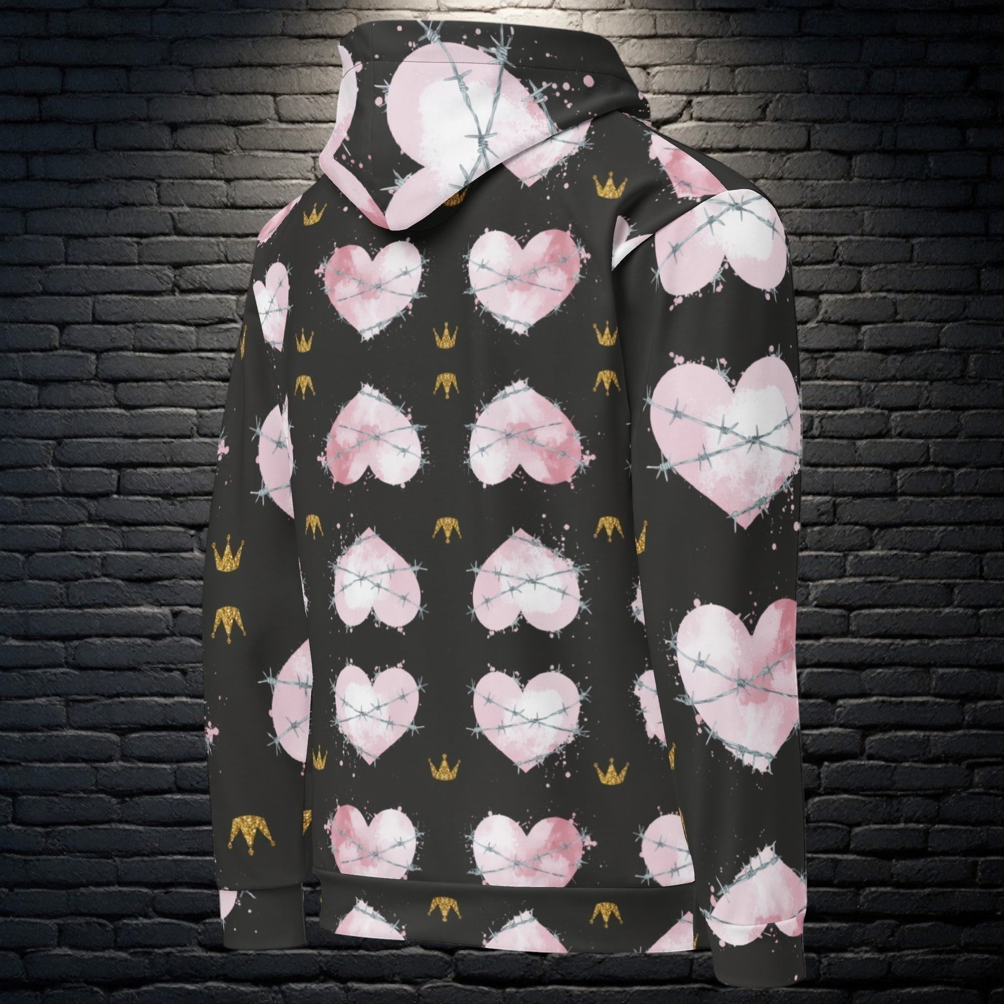 CocoMe Couture Heart of Thorns unisex hoodie with black background, pink heart and barbed wire all-over print.