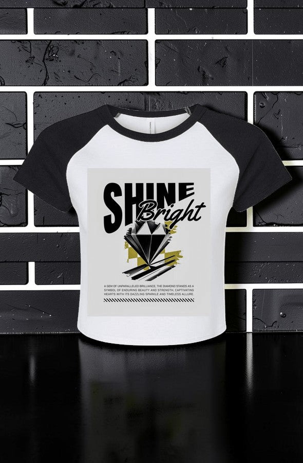 Women's Shine Bright Micro Rib Raglan Baby Tee – Cropped Fitted Stretch Shirt styled as a casual fitted graphic tee