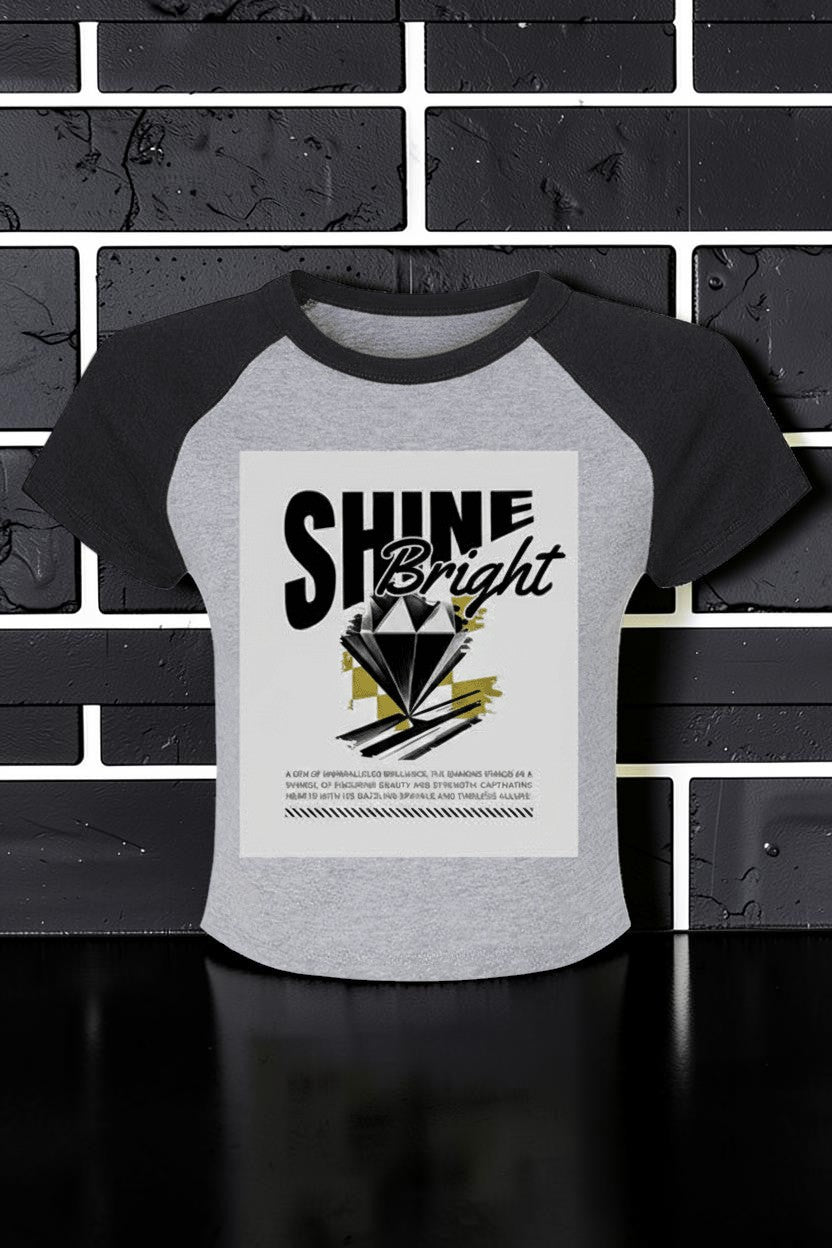 Women's Shine Bright Micro Rib Raglan Baby Tee – Cropped Fitted Stretch Shirt showing the bold Shine Bright graphic and soft micro rib texture