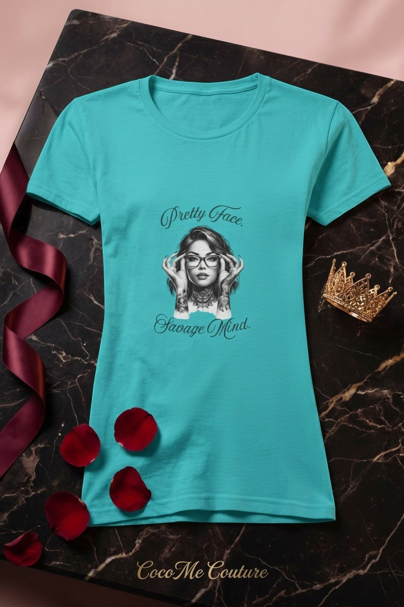 CocoMe Couture sapphire blue heavy cotton tee featuring a Pretty Face Savage Mind graphic print on a marble surface.