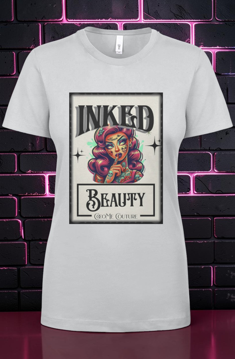 CocoMe Couture silver crewneck graphic t-shirt featuring an Inked Beauty tattoo-style illustration