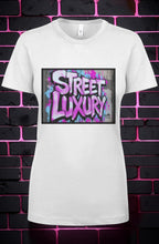 CocoMe Couture white crewneck t-shirt featuring a vibrant pink and blue graffiti-style Street Luxury graphic print.