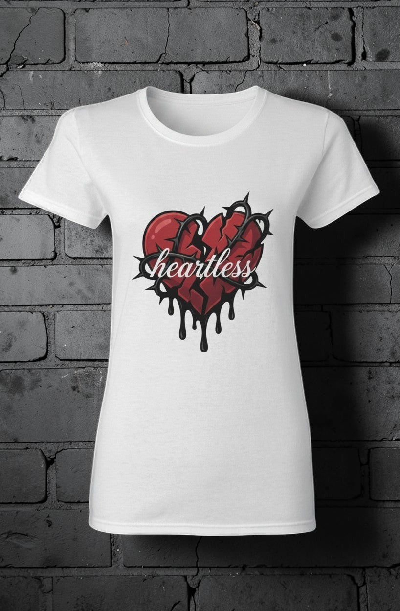 CocoMe Couture white women's heavy cotton tee featuring a graphic of a broken heart wrapped in black barbed wire