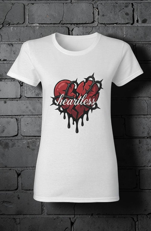 CocoMe Couture white women's heavy cotton tee featuring a graphic of a broken heart wrapped in black barbed wire